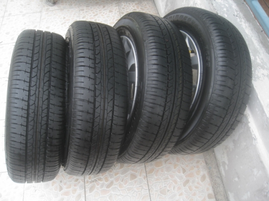 ขายล้อแม็กป้ายแดง Nissan Almera 15"x5.5" et40 4รู100 พร้อมยางปี13สนใจติดต่อเล็กคลองสามครับ 081-3747940