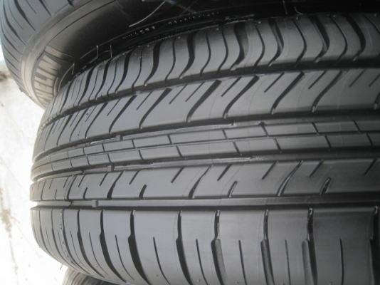 ขายกะทะล้อป้ายแดง Honda jazz,city ขอบ15 4รู100พร้อมยางปี14 สนใจติดต่อเล็กคลองสามครับ 081-3747940