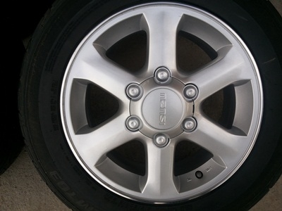 ขายล้อแม็กISUZU GOLD series 16 นิ้ว 6 ก้าน พร้อมยางปี12 4 ล้อ