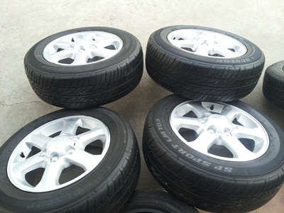 ขายล้อแม็กISUZU GOLD series 16 นิ้ว 6 ก้าน พร้อมยางปี12 4 ล้อ