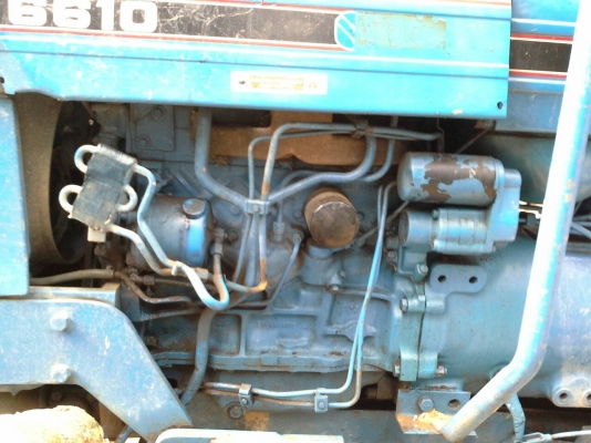 ขายรถไถ FORD 6610 2 เพลา เอกสารเล่ม ใบมีดดันหน้า 7 จาน ราคา 500000