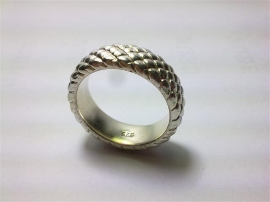 แหวนปลอกมีดเงินลายสัปรด