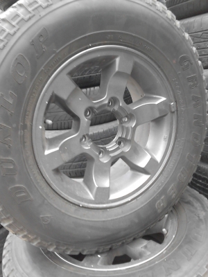 ขอบ 15 พร้อมยาง DUNLOP GRANDTREK 235/70R15 ขาย 4 ล้อ 4800 บาท TEL.081-427-3941 ขอบ 15 พร้อมยาง DUNLOP GRANDTREK 235/70R15 ขาย 4 ล้อ 4800 บาท TEL.081-427-3941