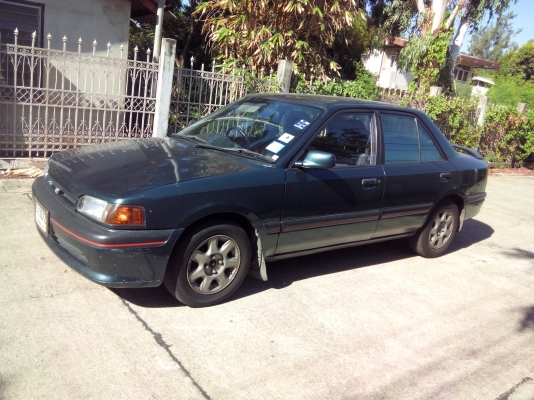 ขายรถมาสด้า 323 เกียร์ออโต้ สีเขียว เจ้าของใช้มือเดียว