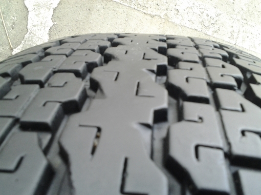 บริสโตน 245/70/16 ดอกตรูมตรูม