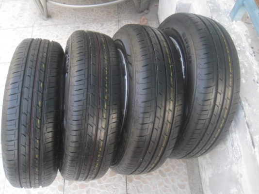 ขายกะทะล้อป้ายแดง Mitsu attrage ขอบ14 4รู100 พร้อมยางปี13 สนใจติดต่อเล็กคลองสามครับ 081-3747940