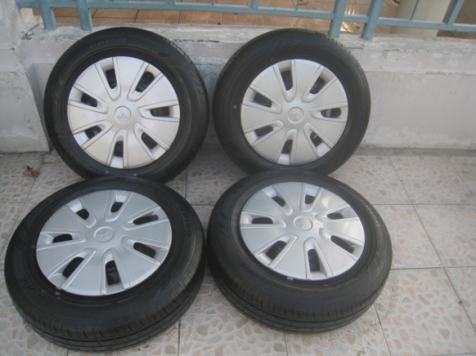 ขายกะทะล้อป้ายแดง Mitsu attrage ขอบ14 4รู100 พร้อมยางปี13 สนใจติดต่อเล็กคลองสามครับ 081-3747940