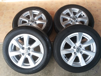 ขายล้อแม็กNISSAN ALMERA VL (TOP)ยางปี13 BRIDGESTONE 4 ล้อ