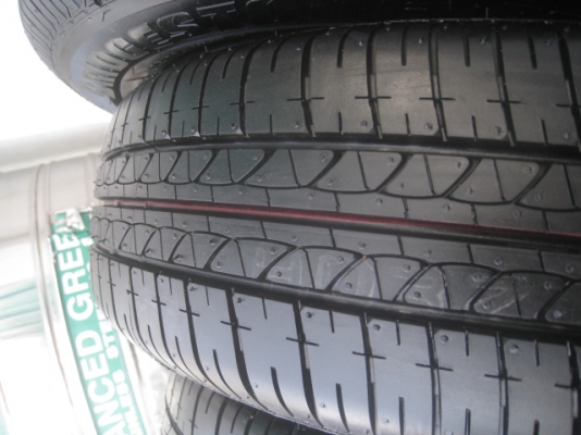 ขายกะทะล้อป้ายแดง nissan almera ขอบ14 4รู100 พร้อมยางปี14 สนใจติดต่อเล็กคลองสามครับ 081-3747940