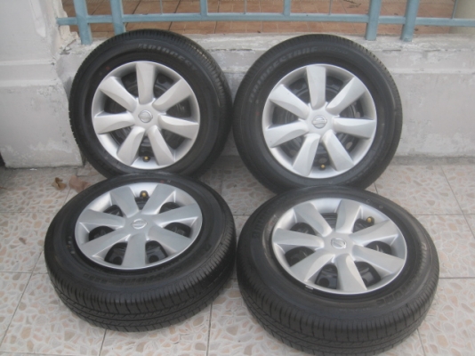 ขายกะทะล้อป้ายแดง nissan almera ขอบ14 4รู100 พร้อมยางปี14 สนใจติดต่อเล็กคลองสามครับ 081-3747940