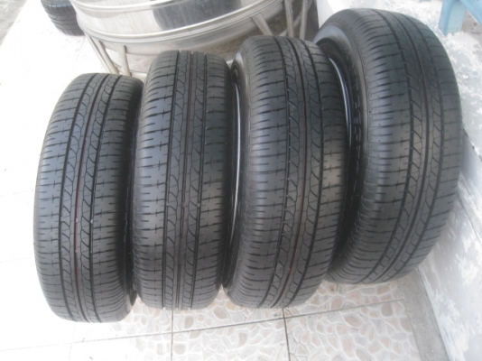 ขายกะทะล้อป้ายแดง nissan almera ขอบ14 4รู100 พร้อมยางปี14 สนใจติดต่อเล็กคลองสามครับ 081-3747940