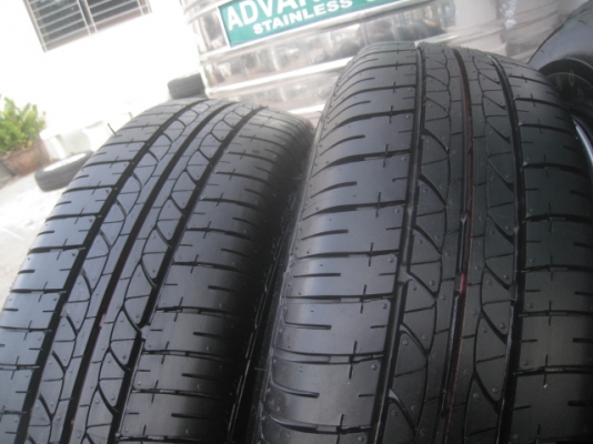 ขายกะทะล้อป้ายแดง nissan almera ขอบ14 4รู100 พร้อมยางปี14 สนใจติดต่อเล็กคลองสามครับ 081-3747940