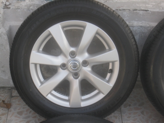 ขายล้อแม็กมือสอง nissan almera 15"x5.5" et40 4รุ100 พร้อมยางปี12 สนใจติดต่อเล็กคลองสามครับ 081-3747940