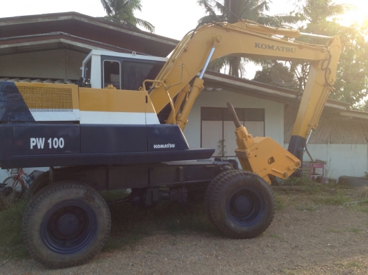 แบคโฮล้อยาง KOMATSU PW100-3 มีลายหัวเจาะ(ไม่รวมหัวเจาะ)
