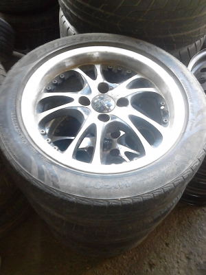 แม๊ก 4 รู 100 มม. พร้อมยางBRIDGESTONE 185/55R15   T.081-427-3941