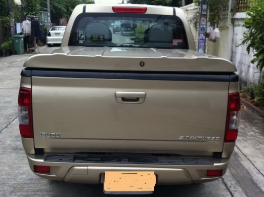 ขายฝาครอบกระบะ ยี่ฮ้อ topup อีซูซุดีแม็ค 4 ประตู สีทอง  ราคา 8000 บาท