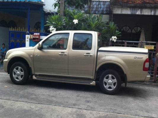 ขายฝาครอบกระบะ ยี่ฮ้อ topup อีซูซุดีแม็ค 4 ประตู สีทอง  ราคา 8000 บาท