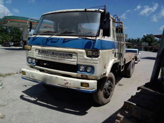 รถนิสสัน  10 ล้อ ท้ายลาด CWM41M.  265 แรงม้า.  สนใจติดต่อ  081 - 6079515