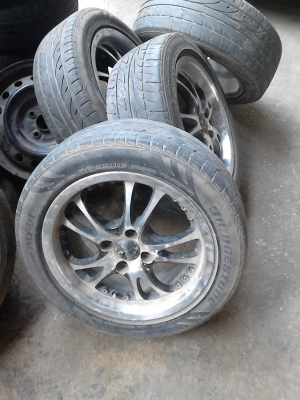 ขอบ 15  แม๊ก 4 รู 100 มม. พร้อมยางBRIDGESTONE 185/55R15   T.081-427-3941