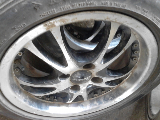 ขอบ 15  แม๊ก 4 รู 100 มม. พร้อมยางBRIDGESTONE 185/55R15   T.081-427-3941