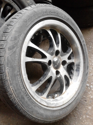 ขอบ 15  แม๊ก 4 รู 100 มม. พร้อมยางBRIDGESTONE 185/55R15   T.081-427-3941