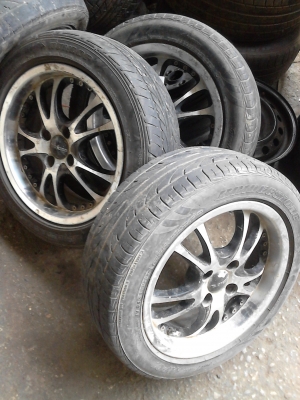 ขอบ 15  แม๊ก 4 รู 100 มม. พร้อมยางBRIDGESTONE 185/55R15   T.081-427-3941