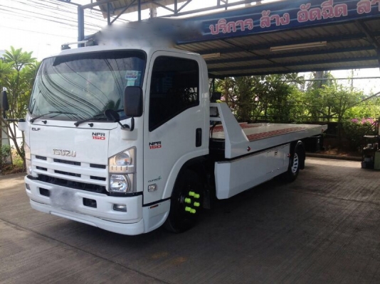รถอีซูซุ 6 ล้อ  พื้นเรียบ NPR  150 แรงม้า. ปี 57  ( รถวิ่ง 1,9xx กม. )  สนใจติดต่อ  081 - 6079515