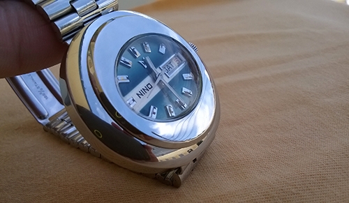 NINO swiss made auto เรือน stainless ทรงไข่ ช่องบอกวัน/วันที่อยู่หลักสาม
