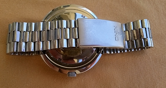 NINO swiss made auto เรือน stainless ทรงไข่ ช่องบอกวัน/วันที่อยู่หลักสาม