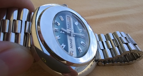 NINO swiss made auto เรือน stainless ทรงไข่ ช่องบอกวัน/วันที่อยู่หลักสาม