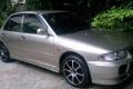 วันเดียวเท่านั้น ลดไปเลย 45000  พร้อมโอน 1996 MITSUBISHI, LANCER 1.5 GLXi-Ltd. โฉม E-CAR 92-96 สีบรอนซ์ทอง เครื่องหัวฉีด เกียร์ออโต้