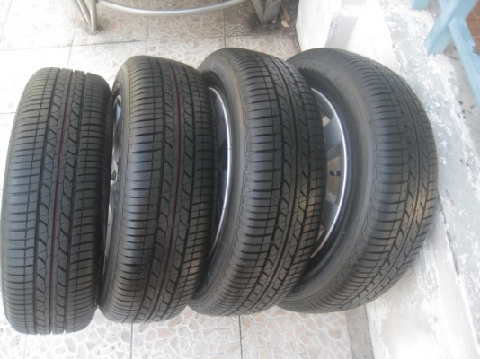 ขายล้อแม็กป้ายแดง nissan almera 15" พร้อมยางปี13 สนใจติดต่อเล็กคลองสามครับ 081-3747940