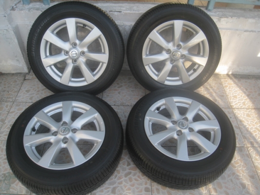 ขายล้อแม็กป้ายแดง nissan almera 15" พร้อมยางปี13 สนใจติดต่อเล็กคลองสามครับ 081-3747940