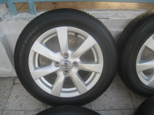 ขายล้อแม็กป้ายแดง nissan almera 15" พร้อมยางปี13 สนใจติดต่อเล็กคลองสามครับ 081-3747940