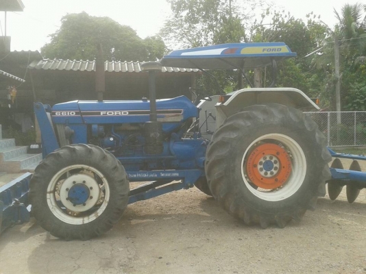 รถไถ ฟอร์ต 6610 S ขับโฟว์ 4WD รถสวยเนี๊ยบ มีใบดันหน้าและ ผาน ๗ ของ CMT ลดราคาพิเศษเหลือเพียง 560,000 บาท.