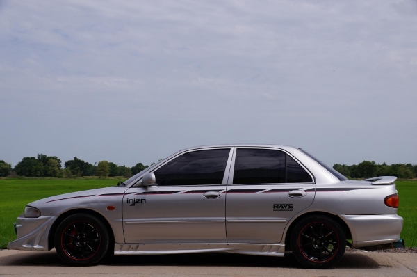 ขาย MITSUBISHI LANCER GLX i ปี 38 รถบ้านสภาพดี เอกสารทะเบียนพร้อมโอน ภาษี พ ร บ 2558  ติดแก๊สแจ้งลงเล่มแล้ว ใช้ได้ 2 ระบบ  ล้อแม็ค ขอบ 15 ADVAN ยางใหม่ BRIDGESTONE เพิ่งเปลี่ยน 4 เส้น  ระบบ ไฟฟ้า เครื่องเล่น CD  ช่วงล่างโครตดี นิ่มมาก เกียร์ ธรรมดา แอร์ ห