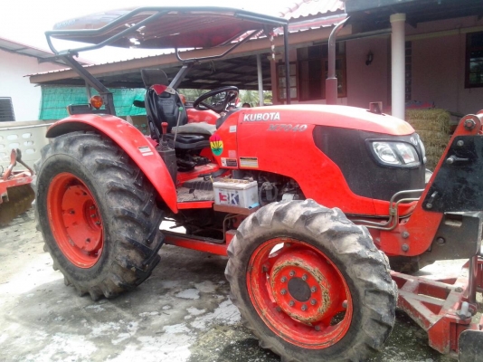 รถไถนาM7040 พร้อมเล่มทะเบียนปี52 รถไถนาM7040 พร้อมเล่มทะเบียนปี52