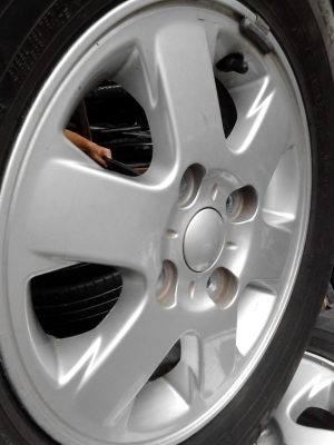 แม๊ก พร้อมยาง ขอบ 14  ขนาด 4 รู 100 185/70R14  ยาง DUNLOP SP10  TEL.081-427-3941