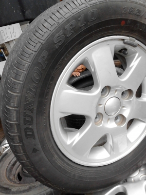 แม๊ก พร้อมยาง ขอบ 14  ขนาด 4 รู 100 185/70R14  ยาง DUNLOP SP10  TEL.081-427-3941