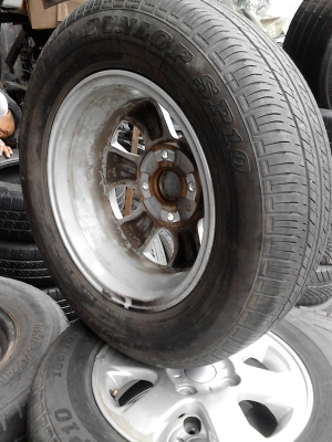 แม๊ก พร้อมยาง ขอบ 14  ขนาด 4 รู 100 185/70R14  ยาง DUNLOP SP10  TEL.081-427-3941