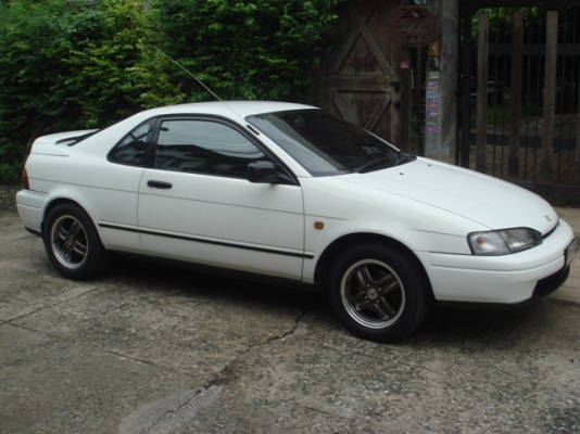 ขายล้อแม็ก enkei แท้japanขอบ14x6off38 4รู100พร้อมยางบริสโตนดอกหนาๆใส่ใช้อยูในรถtoyota paseo