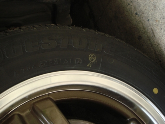 ขายล้อแม็ก enkei แท้japanขอบ14x6off38 4รู100พร้อมยางบริสโตนดอกหนาๆใส่ใช้อยูในรถtoyota paseo