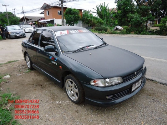 ขาย Mitsubishi lancer ecar สีเขียว ชุดแต่ง+เครื่องเสียง ราคา 65,000 บาท
