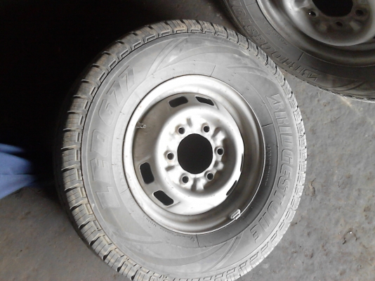 195R14 กะทะล้อพร้อมยางBRIDGESTONE LEO 677  ชุด 4 ล้อ  โทร.081-427-3941