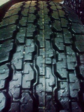 ยางป่าว205R16ป้ายแดงบิดโตนดูเลอร์689ปี13ดอกสวยสีมีตุมเต็ม