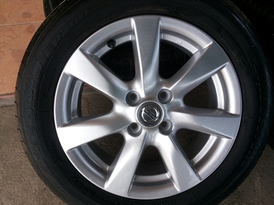 ขายล้อแม็กNISSAN ALMERA VL (TOP)ยางปี13 BRIDGESTONE 4 ล้อ