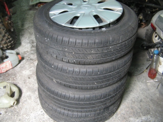 .ขาย ยางพร้อมกระทะและฝาครอบครบชุดขอบ 14 4เส้น สภาพใหม่ ราคา 4,000