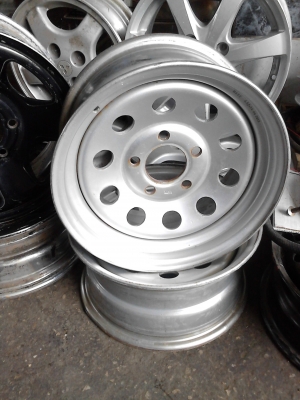 กะทะผ่า 5 รู ขอบ 14  ใส่เพื่อขยายยาง ให้ยื่นออกไปขอบนอก   มี 2 ใบ   Tel.081-427-3945