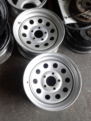 กะทะผ่า 5 รู ขอบ 14  ใส่เพื่อขยายยาง ให้ยื่นออกไปขอบนอก   มี 2 ใบ   Tel.081-427-3945