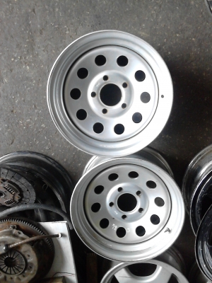 กะทะผ่า 5 รู ขอบ 14  ใส่เพื่อขยายยาง ให้ยื่นออกไปขอบนอก   มี 2 ใบ   Tel.081-427-3945